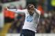 Tottenham Hotspur's Gylfi Sigurdsson, shoots past West Bromwich Albion's Claudio Yacob, during their English Premier League soccer match, at the White Hart Lane stadium in London, Thursday, Dec. 26, 2013. (AP Photo/Bogdan Maran)