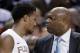 Florida State coach Leonard Hamilton, right, stares at Devon Bookert, left, as he walks off the court during the first half of an NCAA college basketball game against Clemson at the Atlantic Coast Conference men's tournament in Greensboro, N.C., Thursday, March 14, 2013. (AP Photo/Bob Leverone)