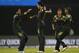 Pakistan's bowler Umar Gul, second left, celebrates the dismissal of Australia's batsman Nathan Coulter-Nile during their ICC Twenty20 Cricket World Cup match in Dhaka, Bangladesh, Sunday, March 23, 2014. (AP Photo/Aijaz Rahi)