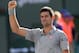Mar 16, 2014; Indian Wells, CA, USA; Novak Djokovic (SRB) reacts as he wins the final of the BNP Paribas Open against Roger Federer (SUI) at the Indian Wells Tennis Garden. Djokovic won 6-3, 3-6, 7-6. Mandatory Credit: Jayne Kamin-Oncea-USA TODAY Sports
