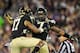 NASHVILLE, TN - DECEMBER 30: A.J. Marshall #17 and Merrill Noel #7 of the Wake Forest Demon Deacons celebrate after Noel's interception against the Mississippi State Bulldogs during play at the Franklin American Mortgage Music City Bowl at LP Field on December 30, 2011 in Nashville, Tennessee. Mississippi State won 23-17. (Photo by Grant Halverson/Getty Images)