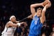 Jan 24, 2014; Brooklyn, NY, USA; Brooklyn Nets small forward Paul Pierce (34) guards Dallas Mavericks power forward Dirk Nowitzki (41) during the first half at Barclays Center. Mandatory Credit: Joe Camporeale-USA TODAY Sports