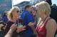 Chelsea Gates interviews Courtney Force before introductions at Auto Plus Raceway in Gainesville.