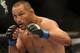 Jun 15, 2013; Winnipeg, MB, Canada; Dan Henderson fights Rashad Evans (left) during their Light Heavyweight bout at UFC 161 at MTS Centre. Mandatory Credit: Tom Szczerbowski-USA TODAY Sports