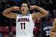 Arizona forward Aaron Gordon reacts after scoring a basket while playing Gonzaga during the first half of a third-round game in the NCAA college basketball tournament, Sunday, March 23, 2014, in San Diego. (AP Photo/Denis Poroy)