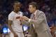 Louisville coach Rick Pitino yells at Louisville guard Russ Smith (2) during the second half in a third-round game in the NCAA college basketball tournament against Saint Louis, Saturday, March 22, 2014, in Orlando, Fla. (AP Photo/Phelan M. Ebenhack)