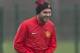 Manchester United's Juan Mata trains with teammates at Carrington training ground in Manchester, Tuesday, March 18, 2014. Manchester United will play Olympiakos in a Champions League last 16 second leg soccer match on Wednesday. (AP Photo/Jon Super)