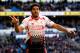 CARDIFF, WALES - MARCH 22: Luis Suarez of Liverpool celebrates after scoring hihs third and his team's sixth goal of the game during the Barclays Premier League match between Cardiff City and Liverpool at Cardiff City Stadium on March 22, 2014 in Cardiff, Wales. (Photo by Ben Hoskins/Getty Images)