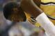 Indiana Pacers center Roy Hibbert leans over while waiting at the free throw line while sweat drips from his forehead, during the first half of an NBA basketball game against the Chicago Bulls in Indianapolis, Friday, March 21, 2014. The Pacers won 91-79. (AP Photo/R Brent Smith)