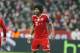 Bayern's Dante looks to his fellow players during the Champions League round of 16 second leg soccer match between FC Bayern Munich and FC Arsenal in Munich, Germany, Wednesday, March 12, 2014. (AP Photo/Matthias Schrader)