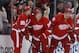 Detroit Red Wings' Gustav Nyquist (14) is congratulated by teammates Niklas Kronwall (55) and Joakim Andersson (18), all of Sweden, during the first period of an NHL hockey game against the Minnesota Wild Sunday, March 23, 2014 in Detroit. (AP Photo/Duane Burleson)