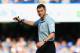 LONDON, ENGLAND - MARCH 22: Referee Andre Marriner in action during the Barclays Premier League match between Chelsea and Arsenal at Stamford Bridge on March 22, 2014 in London, England. (Photo by Richard Heathcote/Getty Images)