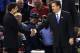 Louisville head coach Rick Pitino, left, shakes hands with Kentucky head coach John Calipari before the first half of an NCAA Final Four semifinal college basketball tournament game Saturday, March 31, 2012, in New Orleans. (AP Photo/Bill Haber)