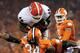 Georgia fullback Quayvon Hicks is stopped at the goal line by Clemson's Quandon Christian during the second half of an NCAA college football game, Saturday, Aug. 31, 2013, at Memorial Stadium in Clemson, S.C. (AP Photo/ Richard Shiro)