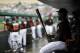 Miami Marlins' Marcell Ozuna sits in the dugout while watching an exhibition spring training baseball game against the Washington Nationals, Monday, March 24, 2014, in Jupiter, Fla. (AP Photo/David Goldman)