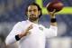 New York Jets quarterback Mark Sanchez, who normally throws right-handed, throws a pass with his left hang before an NFL football between the New England Patriots and the Jets game Thursday, Sept. 12, 2013, in Foxborough. (AP Photo/Charles Krupa)