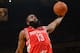 OAKLAND, CA - DECEMBER 13: James Harden #13 of the Houston Rockets dunks against the Golden State Warriors at Oracle Arena on December 13, 2013 in Oakland, California. NOTE TO USER: User expressly acknowledges and agrees that, by downloading and/or using this Photograph, user is consenting to the terms and conditions of the Getty Images License Agreement. Mandatory Copyright Notice: Copyright 2013 NBAE (Photo by Noah Graham/NBAE via Getty Images)