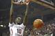 Mar 9, 2014; Tallahassee, FL, USA; Florida State Seminoles forward Okaro White (10) dunks over Syracuse Orange center Baye-Moussa Keita (12) during the first half at Donald L. Tucker Center. Mandatory Credit: Matt Stamey-USA TODAY Sports