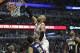 Mar 24, 2014; Chicago, IL, USA; Chicago Bulls forward Taj Gibson (22) dunks the ball against Indiana Pacers forward Evan Turner (12) during the first half at the United Center. Mandatory Credit: David Banks-USA TODAY Sports