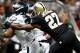 November 5, 2012; New Orleans, LA, USA; Philadelphia Eagles running back Bryce Brown (34) is chased by New Orleans Saints free safety Malcolm Jenkins (27) during the first half of a game at the Mercedes-Benz Superdome. Mandatory Credit: Derick E. Hingle-USA TODAY Sports
