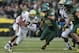 Oct 26, 2013; Eugene, OR, USA; UCLA Bruins quarterback Brett Hundley (17) runs the ball past Oregon Ducks linebacker Rodney Hardrick (48) at Autzen Stadium. Mandatory Credit: Scott Olmos-USA TODAY Sports