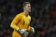 England's goalkeeper Joe Hart plays against Denmark during their international friendly soccer match at Wembley Stadium in London, Wednesday, March 5, 2014. (AP Photo/Sang Tan)
