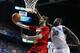 LEXINGTON, KY - DECEMBER 28: Luke Hancock #11 of the Louisville Cardinals shoots the ball while defended by Julius Randle #30 of the Kentucky Wildcats during the game at Rupp Arena on December 28, 2013 in Lexington, Kentucky. (Photo by Andy Lyons/Getty Images)