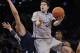 Creighton's Doug McDermott (3) drives past Xavier's Isaiah Philmore during the first half of an NCAA college basketball game in the semifinals of the Big East Conference tournament Friday, March 14, 2014, at Madison Square Garden in New York. (AP Photo/Frank Franklin II)