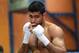 BOLTON, ENGLAND - MARCH 24: Amir Khan shadow boxes during a media workout at the Gloves Community Centre on March 24, 2014 in Bolton, England. (Photo by Alex Livesey/Getty Images)