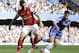 Chelsea's Cesar Azpilicueta, right, and Arsenal's Olivier Giroud vie for the ball during the English Premier League soccer match between Chelsea and Arsenal at Stamford Bridge stadium in London, Saturday, March 22, 2014. (AP Photo/Kirsty Wigglesworth)