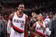 PORTLAND, OR - DECEMBER 21: Damian Lillard #0 and LaMarcus Aldridge #12 of the Portland Trail Blazers smile after the game against the New Orleans Pelicans on December 21, 2013 at the Moda Center Arena in Portland, Oregon. NOTE TO USER: User expressly acknowledges and agrees that, by downloading and or using this photograph, user is consenting to the terms and conditions of the Getty Images License Agreement. Mandatory Copyright Notice: Copyright 2013 NBAE (Photo by Sam Forencich/NBAE via Getty Images)