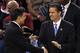 Louisville head coach Rick Pitino, left shakes hands with Kentucky head coach John Calipari before the first half of an NCAA Final Four semifinal college basketball tournament game Saturday, March 31, 2012, in New Orleans. (AP Photo/Bill Haber)