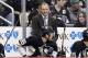 Pittsburgh Penguins head coach Dan Bylsma stands behind his bench during an NHL hockey game between the Pittsburgh Penguins and the Tampa Bay Lightning in Pittsburgh, Saturday, March 22, 2014. (AP Photo/Gene J. Puskar)