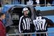 Officials watch an instant replay after a San Francisco 49ers touchdown against the Carolina Panthers during the first half of a divisional playoff NFL football game, Sunday, Jan. 12, 2014, in Charlotte, N.C. (AP Photo/Chuck Burton)