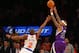 Feb 12, 2014; New York, NY, USA; Sacramento Kings point guard Isaiah Thomas (22) shoots a three-pointer over New York Knicks point guard Raymond Felton (2) at Madison Square Garden. Sacramento Kings defeat the New York Knicks 106-101 in OT. Mandatory Credit: Jim O'Connor-USA TODAY Sports