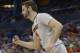 Louisville forward Luke Hancock (11) celebrates a three-point shot during the second half in a third-round game in the NCAA college basketball tournament against Saint Louis, Saturday, March 22, 2014, in Orlando, Fla. (AP Photo/Phelan M. Ebenhack)