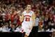 Mar 22, 2014; Milwaukee, WI, USA; Wisconsin Badgers guard Josh Gasser (21) celebrates a 3-point shot in the second half of a men's college basketball game against the Oregon Ducks during the third round of the 2014 NCAA Tournament at BMO Harris Bradley Center. Mandatory Credit: Jeff Hanisch-USA TODAY Sports