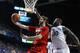 LEXINGTON, KY - DECEMBER 28: Luke Hancock #11 of the Louisville Cardinals shoots the ball while defended by Julius Randle #30 of the Kentucky Wildcats during the game at Rupp Arena on December 28, 2013 in Lexington, Kentucky. (Photo by Andy Lyons/Getty Images)