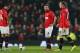 MANCHESTER, ENGLAND - MARCH 25: Javier Hernandez of Manchester United and team-mates Juan Mata and Wayne Rooney (R) look dejected after conceding the third goal during the Barclays Premier League match between Manchester United and Manchester City at Old Trafford on March 25, 2014 in Manchester, England. (Photo by Alex Livesey/Getty Images)