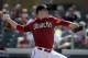 Arizona Diamondbacks starting pitcher Archie Bradley throws to the Seattle Mariners during the first inning of a spring exhibition baseball game in Scottsdale, Ariz., Thursday, March 13, 2014. (AP Photo/Chris Carlson)