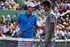 KEY BISCAYNE, FL - MARCH 26: Andy Murray of Great Britain and Novak Djokovic of Serbia discuss whether Djokovic's raquet touched the net during a point during their match on day 10 of the Sony Open at Crandon Park Tennis Center on March 26, 2014 in Key Biscayne, Florida. (Photo by Al Bello/Getty Images)