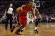 Jan 15, 2014; Boston, MA, USA; Toronto Raptors point guard Kyle Lowry (7) drives to the basket while guarded by Boston Celtics guard Jerryd Bayless (11) during the first quarter at TD Garden. Mandatory Credit: Greg M. Cooper-USA TODAY Sports