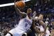 Oklahoma City Thunder forward Serge Ibaka (9) grabs a rebound in front of Memphis Grizzlies forwrd Mike Miller (13) during the fourth quarter of an NBA basketball game in Oklahoma City, Friday, Feb. 28, 2014. Oklahoma City won 113-107. (AP Photo/Sue Ogrocki)