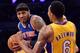 Mar 25, 2014; Los Angeles, CA, USA; New York Knicks forward Carmelo Anthony (7) drives to the basket on Los Angeles Lakers guard Kent Bazemore (6) during second quarter action at Staples Center. Mandatory Credit: Robert Hanashiro-USA TODAY Sports