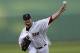 Boston Red Sox starting pitcher Jon Lester pitches in the first inning of an exhibition baseball game against the Philadelphia Phillies in Fort Myers, Fla., Saturday, March 15, 2014. (AP Photo/Gerald Herbert)