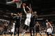 CHARLOTTE, NC - MARCH 26: Josh McRoberts #11 of the Charlotte Bobcats tries to take the ball from Paul Pierce #34 of the Brooklyn Nets during the game at the Time Warner Cable Arena on March 26, 2014 in Charlotte, North Carolina. NOTE TO USER: User expressly acknowledges and agrees that, by downloading and or using this photograph, User is consenting to the terms and conditions of the Getty Images License Agreement. Mandatory Copyright Notice: Copyright 2014 NBAE (Photo by Brock Williams-Smith/NBAE via Getty Images)