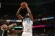 CHARLOTTE, NC - MARCH 26: Al Jefferson #25 of the Charlotte Bobcats shoots against the Brooklyn Nets during the game at the Time Warner Cable Arena on March 26, 2014 in Charlotte, North Carolina. NOTE TO USER: User expressly acknowledges and agrees that, by downloading and or using this photograph, User is consenting to the terms and conditions of the Getty Images License Agreement. Mandatory Copyright Notice: Copyright 2014 NBAE (Photo by Brock Williams-Smith/NBAE via Getty Images)