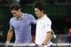 KEY BISCAYNE, FL - MARCH 26: Roger Federer of Switzerland at the net after his three set defeat congratulates Kei Nishikori of Japan during their quarter final round match during day 10 at the Sony Open at Crandon Park Tennis Center on March 26, 2014 in Key Biscayne, Florida. (Photo by Clive Brunskill/Getty Images)