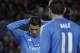 Real Madrid's Cristiano Ronaldo, left, from Portugal reacts during a La Liga soccer match against Sevilla at the Ramon Sanchez Pizjuan stadium, in Seville, Spain on Wednesday, March 26, 2014. (AP Photo/Angel Fernandez)
