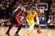 INDIANAPOLIS, IN - MARCH 26: Paul George #24 of the Indiana Pacers drives against LeBron James #6 of the Miami Heat during a game on March 26, 2014 at Bankers Life Fieldhouse in Indianapolis, IN. NOTE TO USER: User expressly acknowledges and agrees that, by downloading and or using this photograph, User is consenting to the terms and conditions of the Getty Images License Agreement. Mandatory Copyright Notice: Copyright 2014 NBAE (Photo by Nathaniel S. Butler/NBAE via Getty Images)